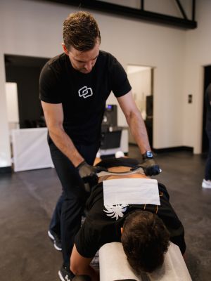 Dr performing scraping treatment